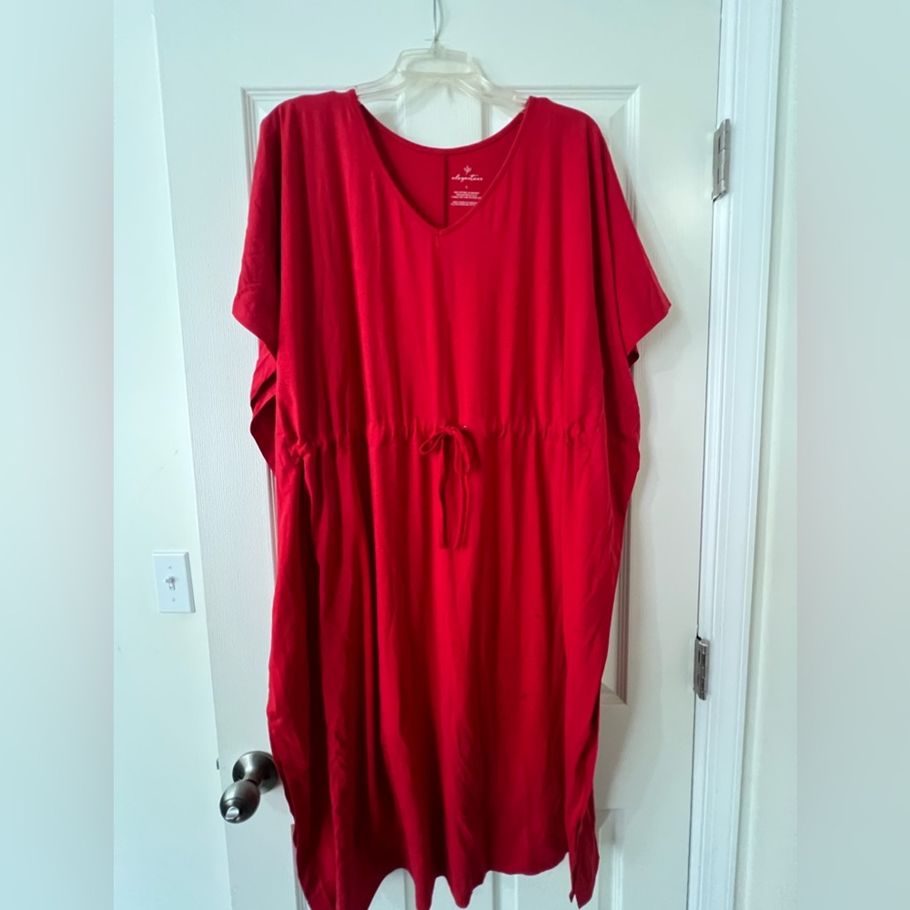 LAST CHANCE - Elegantees dress with ruffle detail on the side.
